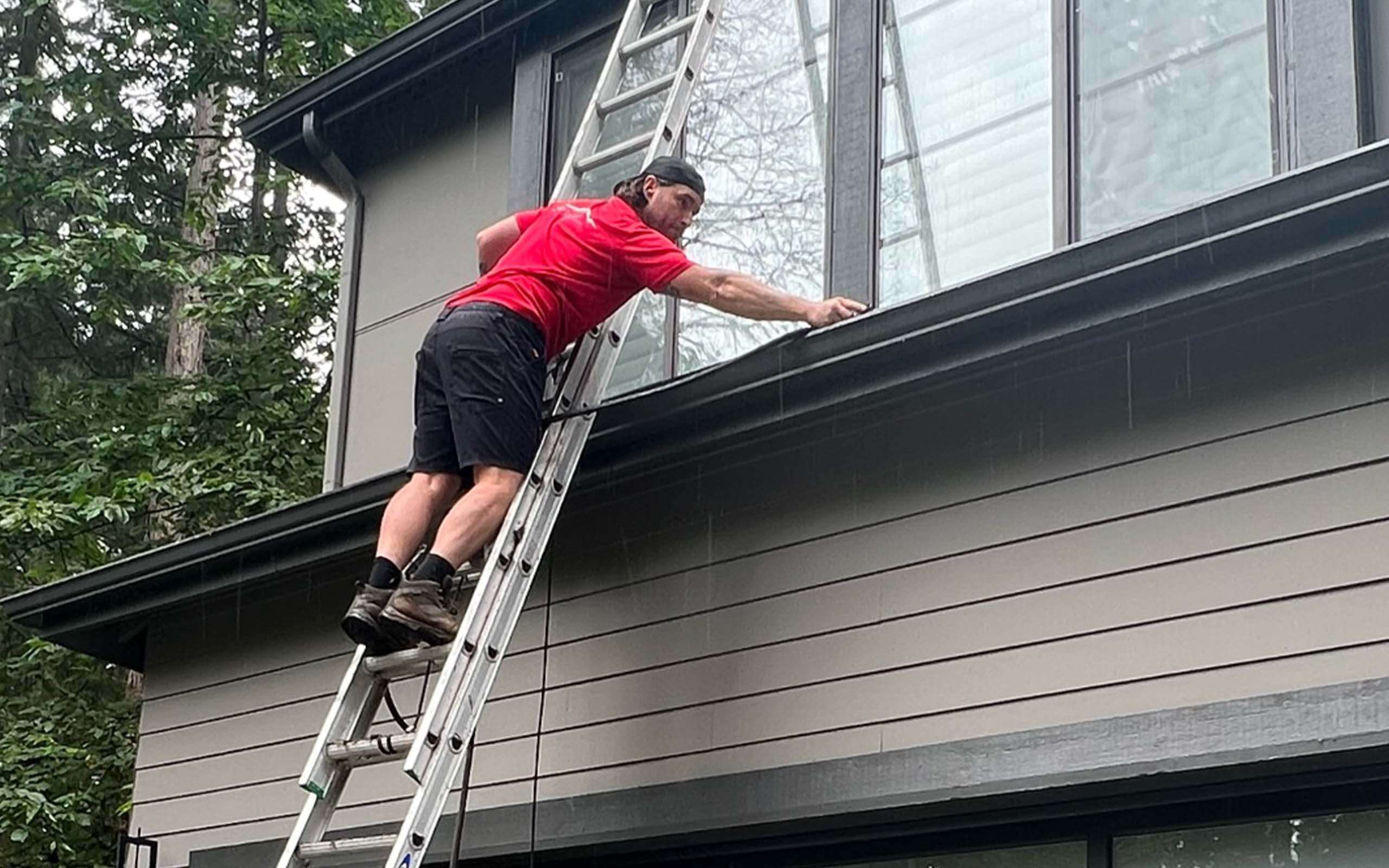 removing debris from gutters in Tacoma homes